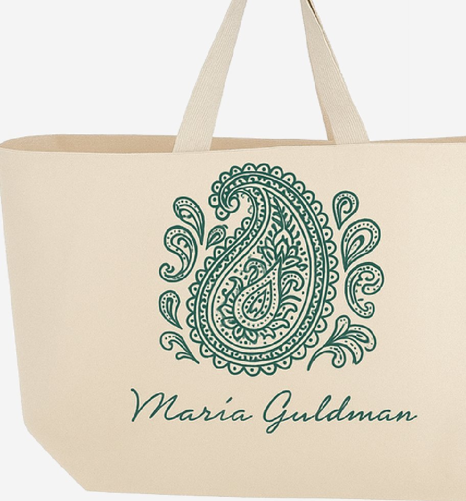 Bolso de tela con ilustración paisley en verde.